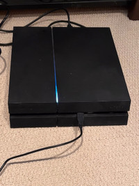 PS4 500GB console and controller