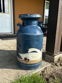 Painted milk container with glass top 