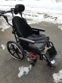 Wheelchair Super Tilt Plus with Roho inflatable seat.