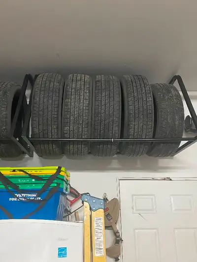 Tire storage racks for the garage wall.
