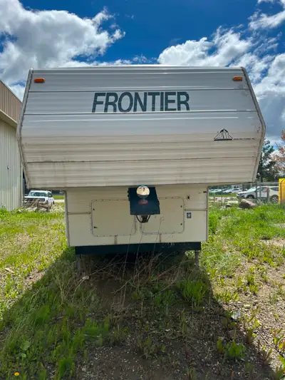 2001 Frontier fifth wheel, sleeps 6, awning, solar panel, power front jacks, lots of storage in and...