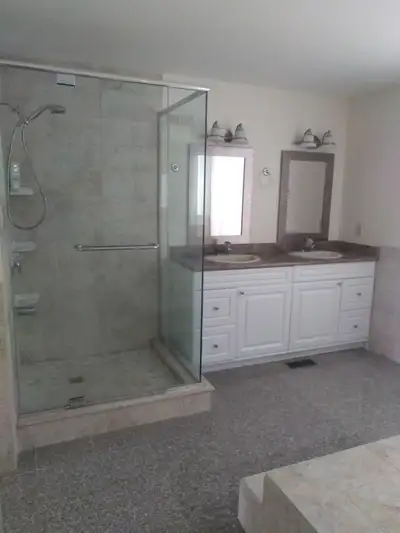 *A large master bedroom with a large 6-piece ensuite, an 18 cubic ft top freezer refrigerator, a din...