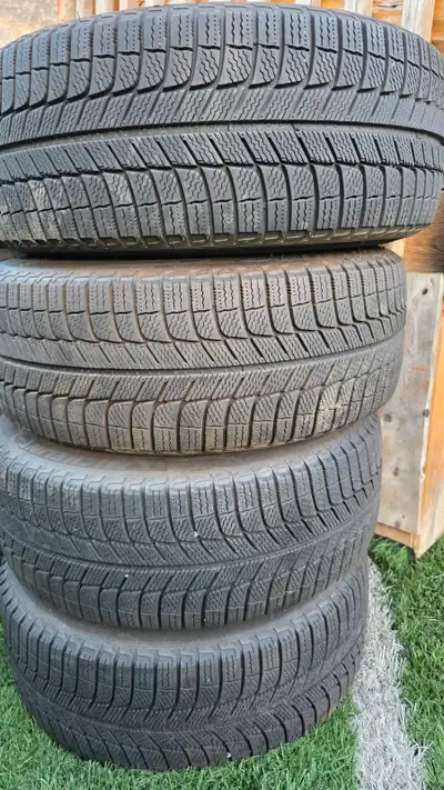 selling four18 inch Michelin winter tires with alloy rims with tpms sensors for $1050. 85% of tread...