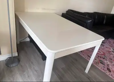 Selling extendable white dining table in great condition, View more