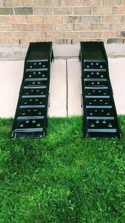 NEW STEEL, CAR RAMPS, never been used, with two extentions pieces, which help to go up onto the ramp...