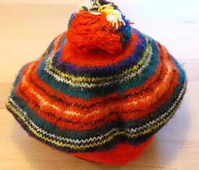 Womans vintage Jaeger 100% English wool tam/beret. Multi coloured striped pattern and a pompom on to...