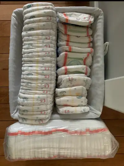 *PRICE IS FIRM* •33 Sz 6 Huggies Little Movers Plus Disney Diapers •36 pack of Sz 4T-5T Pull ups plu...
