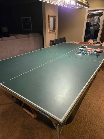 Ping Pong table for sale with all accessories shown. Mounts over a pool table or freestanding. Suita...