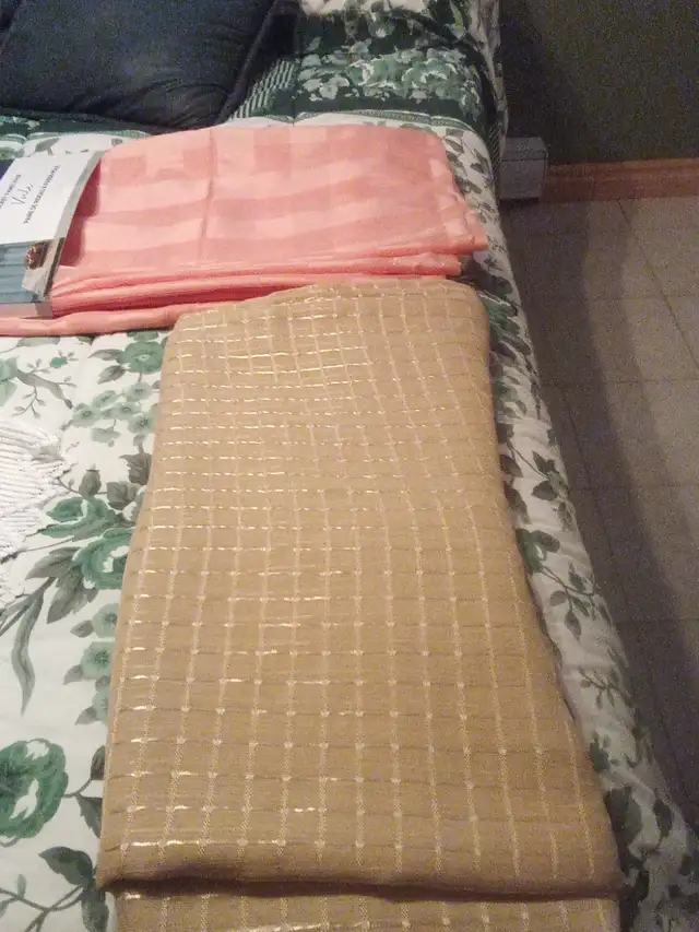 Assortment of Curtains in Various Colors and Sizes