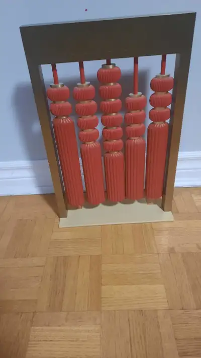 Vintage Cartier display inspired by Chinese lanterns. Heavy piece 16.5" high,11"long and 1"wide.Bott...