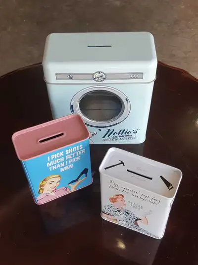 3 vintage themed coin banks / Tins, View more