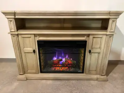 Beautiful Twin-Star full-size electric fireplace with media console/storage cabinet. Works perfectly...