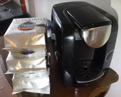 Tassimo machine and coffee, View more