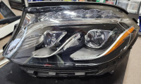NEW LEFT HEADLAMP FOR GL450/500/GL63.. MERCEDES *SMALL SCRATCH*