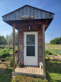 Fancy cedar outhouse