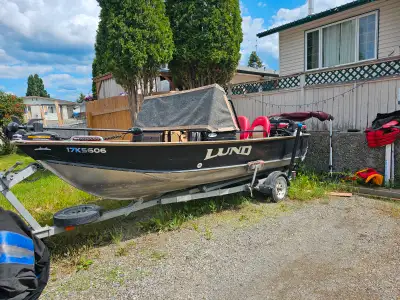 16ft. 1999 lund fishing boat. Ez load trailer. 60hp merc. main, 6hp suzuki kicker, electric trolling...
