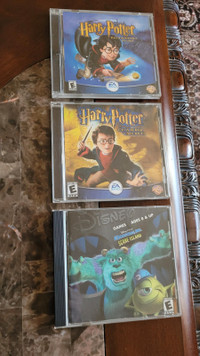 3 jeux pour PC : deux Harry Potter and Monsters Inc.