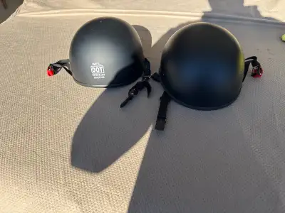 These are two WCL DOT certified motorcycle helmets, perfect for ensuring safety on the road. One hel...