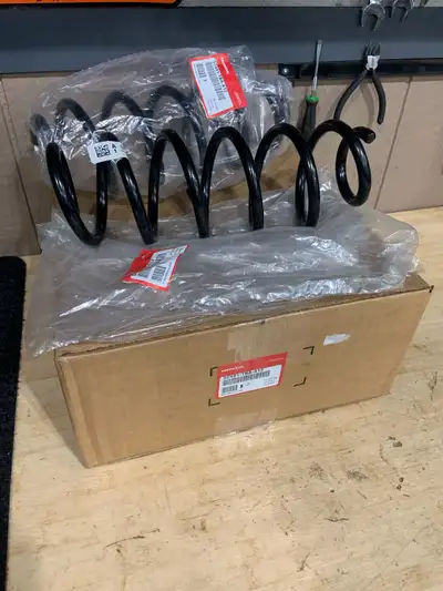 Pair of new OEM Honda rear coil springs, brand new, never installed. Honda part number: 52441-TBA-A1...