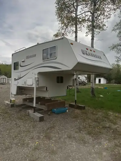 2005 Okanogan 811SL truck camper. Very well kept, clean, everything works, has one slide out for din...
