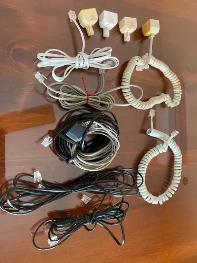 Box of phone line cords, line splitters All in excellent condition Full lot for only 5$ Pick-up in E...