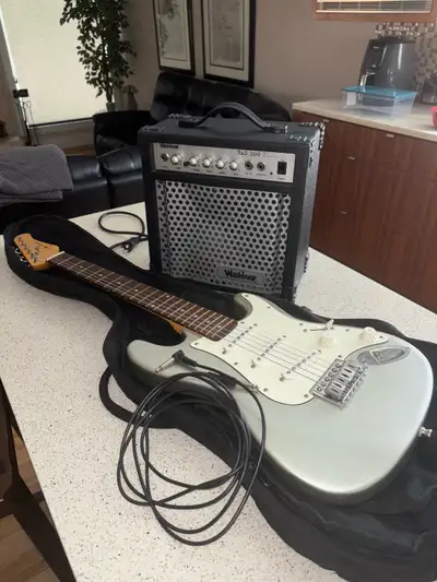 Selling my Jay Turser electric guitar with a Washburn Bad Dog BD12 amplifier – a perfect bundle for...