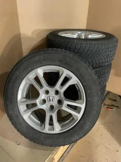 A set of mc Michelin x-ice Snow tires with rims, Here are the specs: --225/65R17 --Bolt pattern 5x12...
