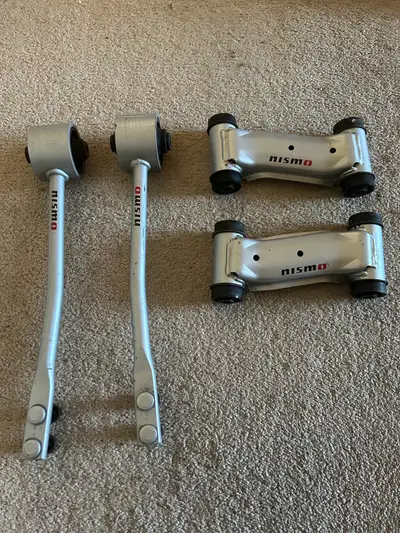 Nismo tension rods and front upper links for Nissan skyline r32 GTR. Used but good condition bushing...