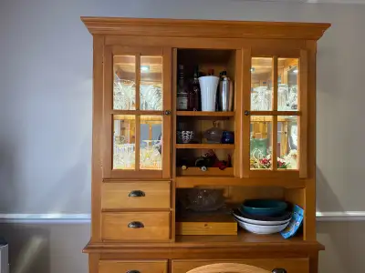 Beautiful wood china cabinet with lights. 81 inches tall, 52 inches wide and 17 inches deep. Pick up...
