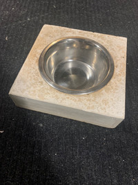 Pet food dish in cement