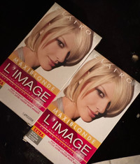 two boxes of Clairol maxi blonde hair dye 