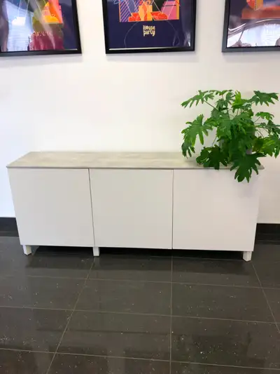 Modern white sideboard cabinet with a clean, minimalist design Great size and super versatile — work...