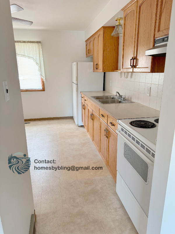 $1,500/month 2-Bed/1-Bath ~780 sqft Apt (with single garage) in Long Term Rentals in Lethbridge