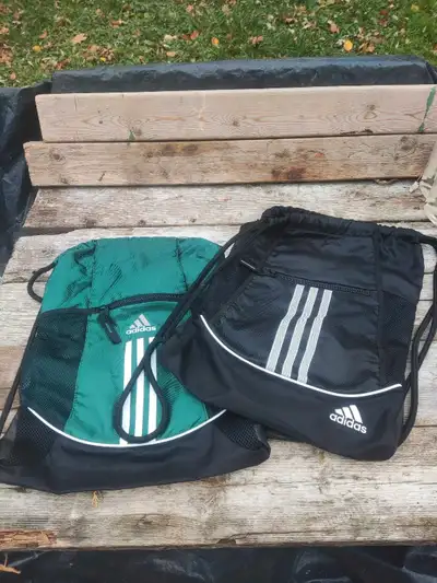 Unused Pair Of Adidas Drawstring Backpacks, View more