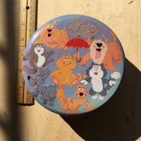 Decorative "Raining Cat's & Dog's Tin