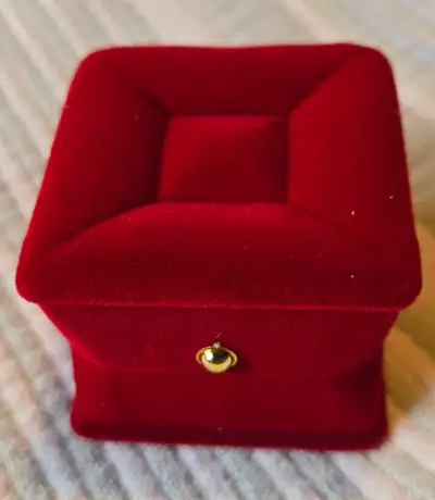 Elegant red velvet box brand new. Has gold clasp. Inside is white satin and velvet, perfect for a ri...