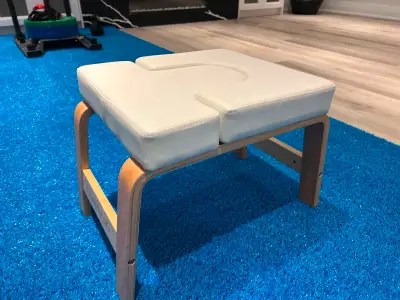 One side comes out to convert bench to headstand chair. Original owner, gently used only a few times...