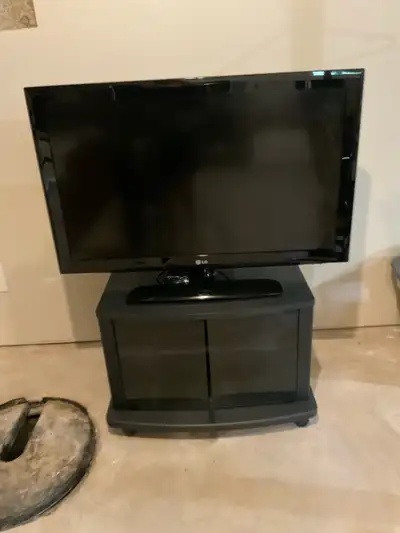 36” LG TV and TV stand, View more