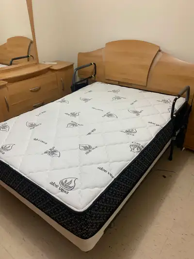 Bed frame with a firm double mattress, View more