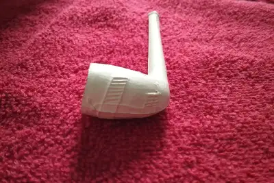 Never used. Measures 4 inches long.