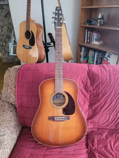 Beautiful Seagull S6+ GT acoustic guitar. Hand crafted in Canada. Very nice condition, no scratches,...