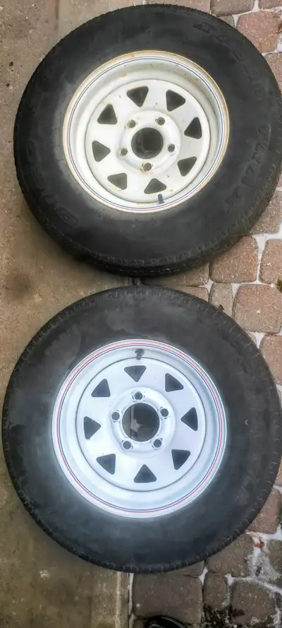 I have two used 13inch trailer rims . I'm asking $25 each. The tires are too old and worn to be used...