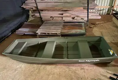 10’ Sea nymph Jon boat with 2 HP Honda 4-stroke motor Includes Original paddle oars that lock in pla...