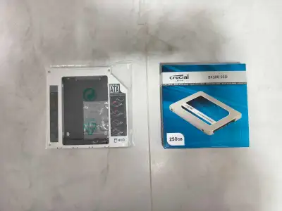 Brand new Crucial 250GB SSD with laptop caddy, View more