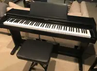Very excellent beautiful sounding 88 key piano w/ seat