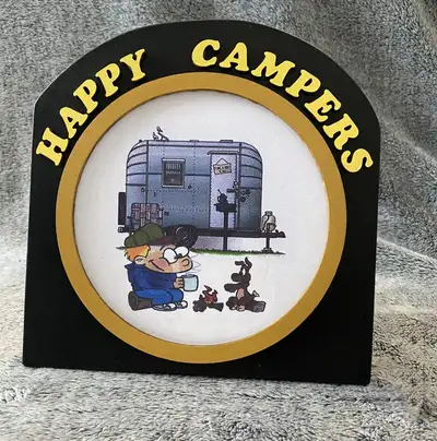Happy Camper Signs. Made out of wood, roughly 8"x8" Held up by an easel. Asking $30.00, shipping ext...