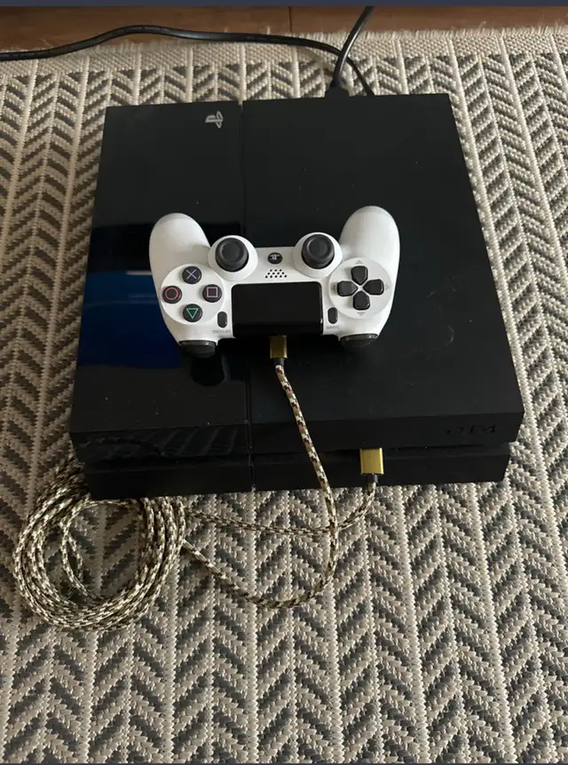 Playstation 4 console and remote628632807564831225