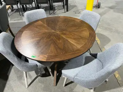 Round 48” dining table has a few minor marks, comes with 4 chairs, $600 Hi our warehouse is at 133 P...
