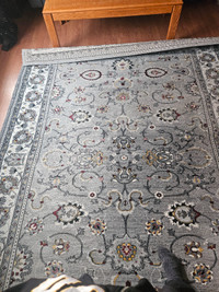 Large area rug.  Grey in color. 200cm x 290cm