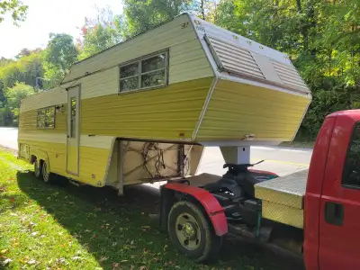 This vintage Prowler travel trailer RV is ready for its next adventure! Though it's showing its age...